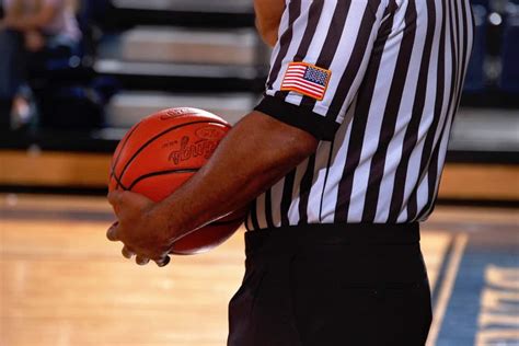 referee basketball drop test before a game starts|basketball referee conference.